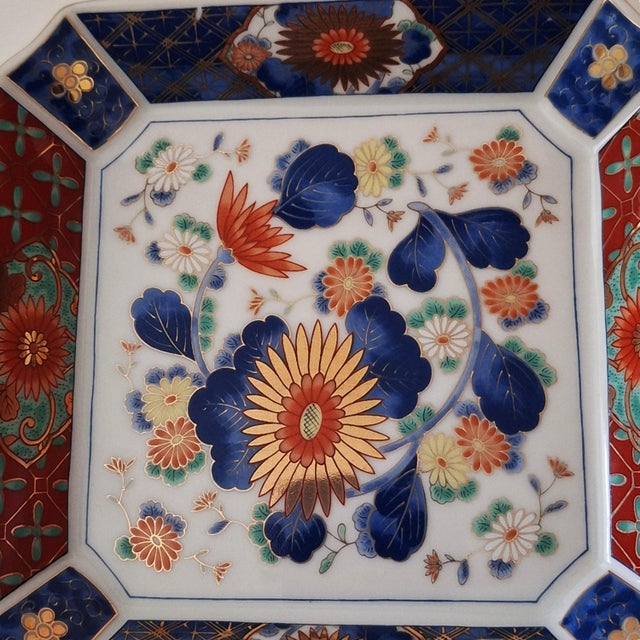 This item is a vintage Imari Japanese porcelain dish, specifically matching styles often described as Imari ware or...