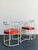 This striking vintage patio set captures the glamorous spirit of Hollywood Regency design, featuring two chairs and a...