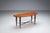 This asymmetrical coffee table balances sculptural form with refined craftsmanship. Its organically shaped wooden top...
