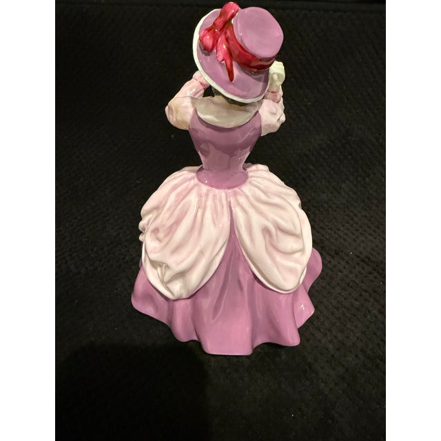 Pink/Mauve Dress, Red Hat, Holding Mirror Likely “Vanity” HN2475 or “Pensive Moments” HN2704