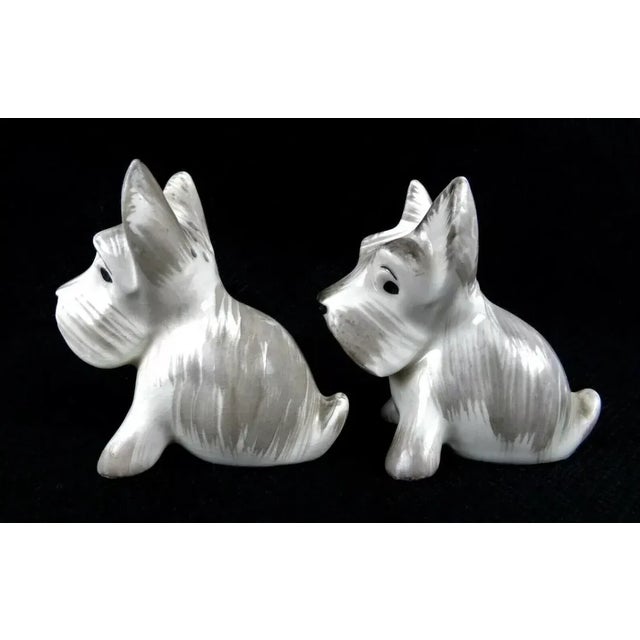 Extraordinary pair of 1950s, masterfully hand painted, Scottie (Scottish) or Westie (West Highland White) Terrier Dogs,)...