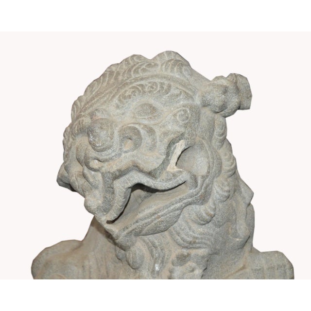 A Chinese Qing dynasty hand-carved stone foo dog temple sculpture from the mid to late 19th century mounted on custom...