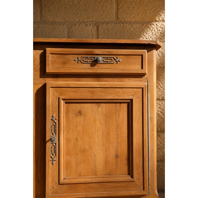 Antique solid wood sideboard, fully waxed, with a superb light patina and magnificent golden highlights. its warm and...