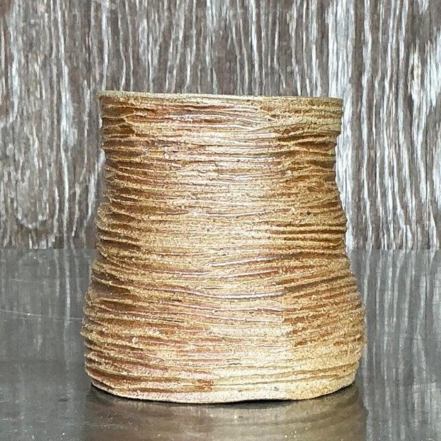 Elevate your space with this stunning vintage Boho layered studio pottery vase. Handcrafted with earthy tones and textured...