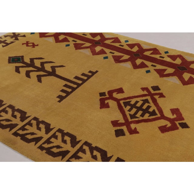 Made with hand-knotted wool and originating circa 1960-1970, this 7x9 vintage rug is a rich new curation in Rug & Kilim’s...