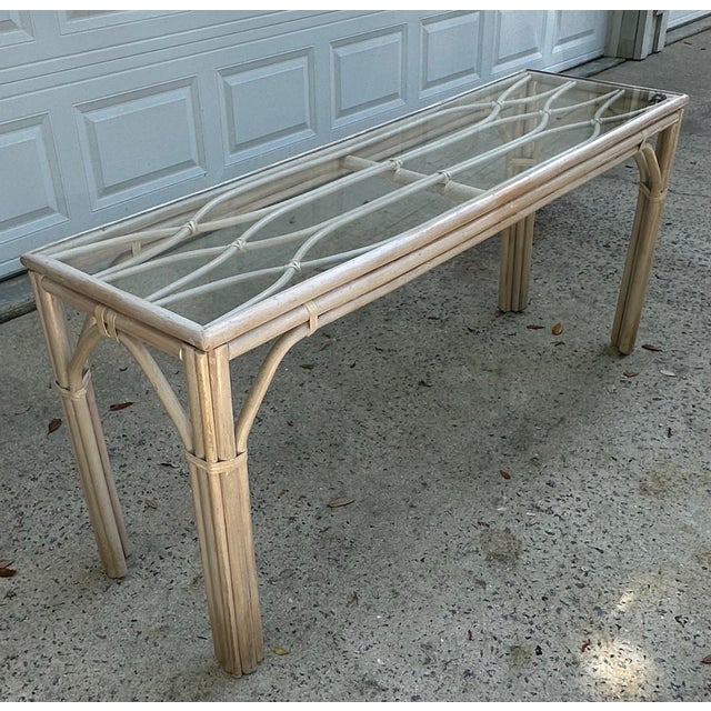 Keep the taupe or get your spray paint out, this is a great looking rattan console or sofa table with rawhide strapping....