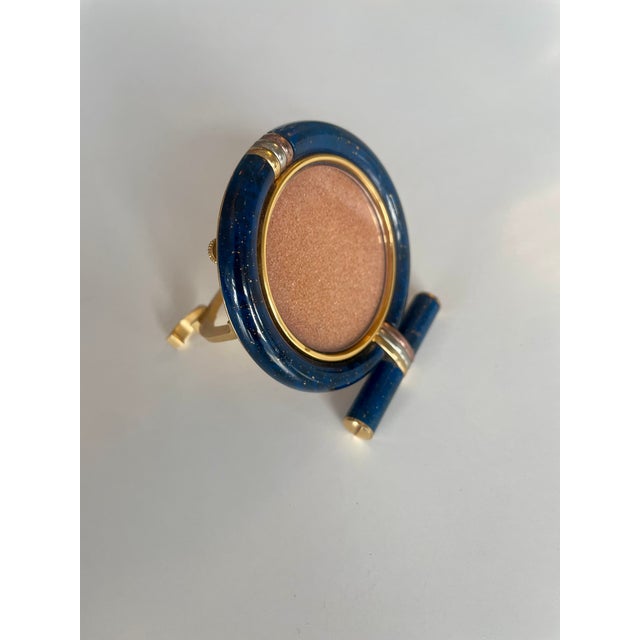 A very elegant and exceptionally well-preserved lapis lazuli picture frame by Les Mushes de Cartier. This piece has an...