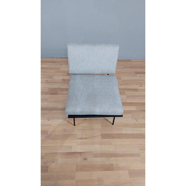 Florence Knoll model armchair 31, made in the 1950s for Knoll International. Black lacquered metal structure in its...