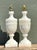 This exquisite pair of vintage table lamps is masterfully carved from solid Italian alabaster, showcasing a timeless...
