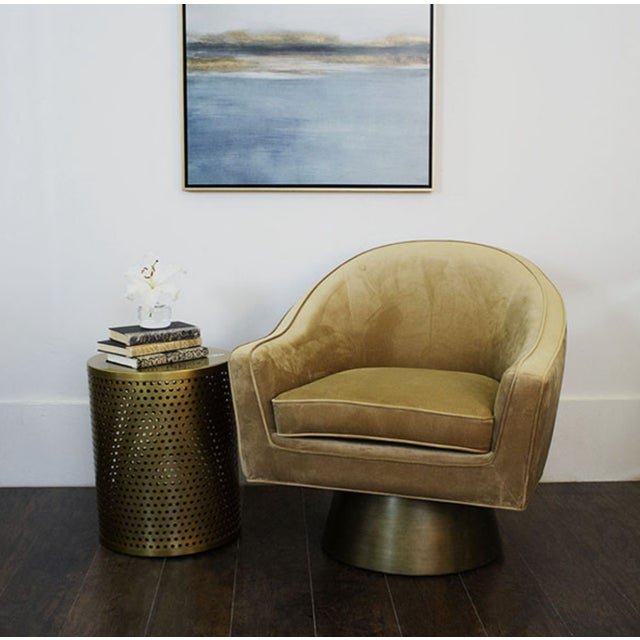 New special order item. Not vintage. This bold, barrel back swivel chair will steal the show. Offered in lux camel velvet...