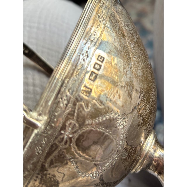 A charming pair of antique English Silver Plate sugar baskets dating to the late Victoria/ early Edwardian period, circa...