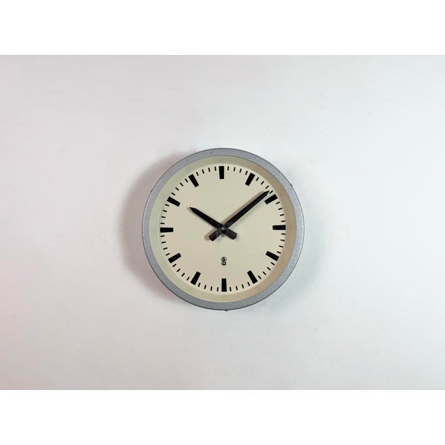 Industrial factory wall clock made in former East Germany ( DDR ) by GW ( Geratewerk Leipzig ) during the 1960s. It...
