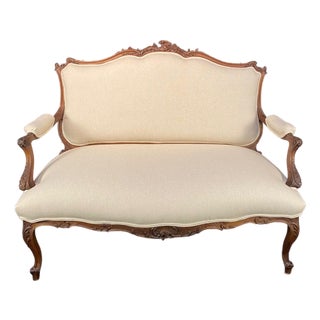 Antique French Walnut Sofa With Museum Quality Carving and New Upholstery For Sale