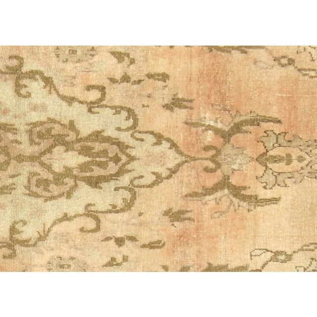 1960s Turkish Oushak Rug. Handwoven with wool on wool foundation in the Oushak region of Western Turkey. The Anatolian...