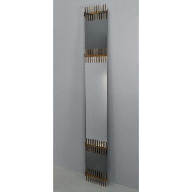 Rare mirror by Ettore Sottsass. Part of a small series produced by Santambrogio and De Berti in the late 1950s. Colored...