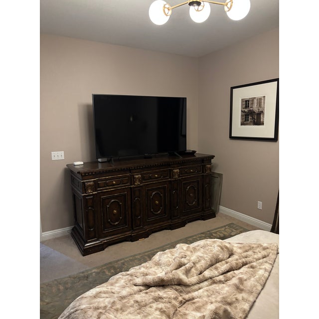 Absolutely stunning Marge Carson credenza. Classical old world details with functional features. Three doors with shelves...