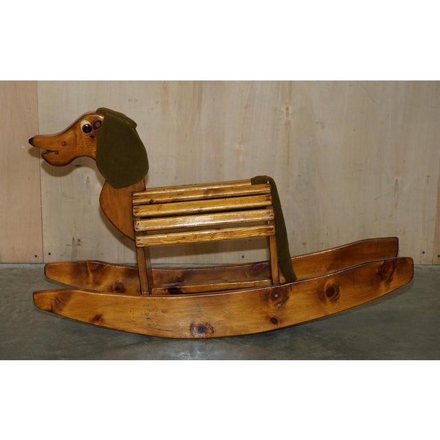 One of a kind hand made in England rocking horse in the form of a Sausage dog. What a charming period piece of children’s...