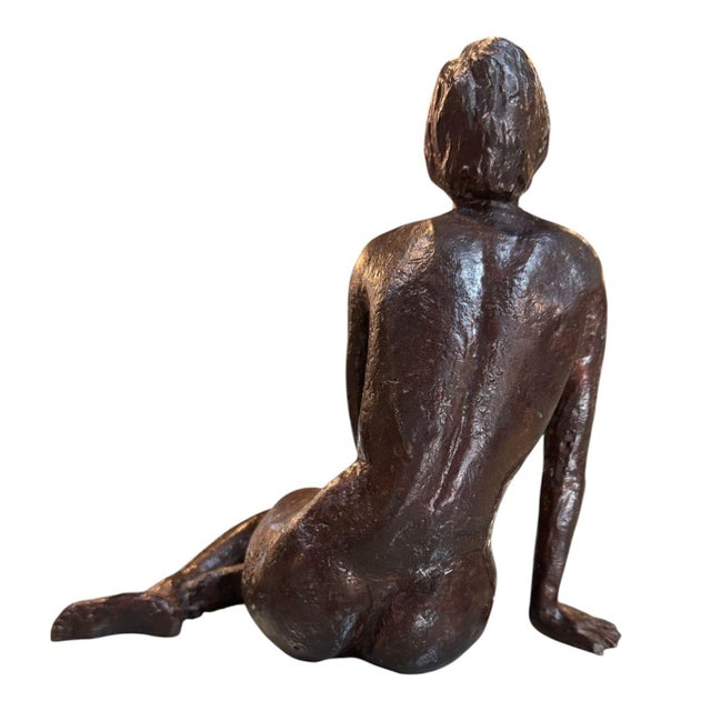 Beautiful hand cast bronze sculpture of a seated nude woman, done in a loose, expressive, impressionistic style. The...