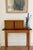A mid-century masterpiece in miniature. This teak storage chest mimics the iconic aesthetic of full-scale Scandinavian...