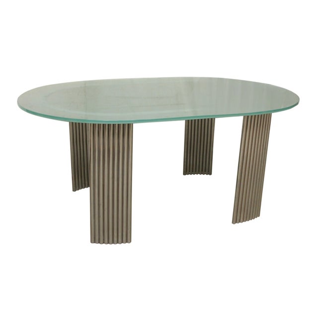 Art Deco glass oblong shaped table with rounded ends. The tabletop is a half-inch blue glass in excellent condition, with...