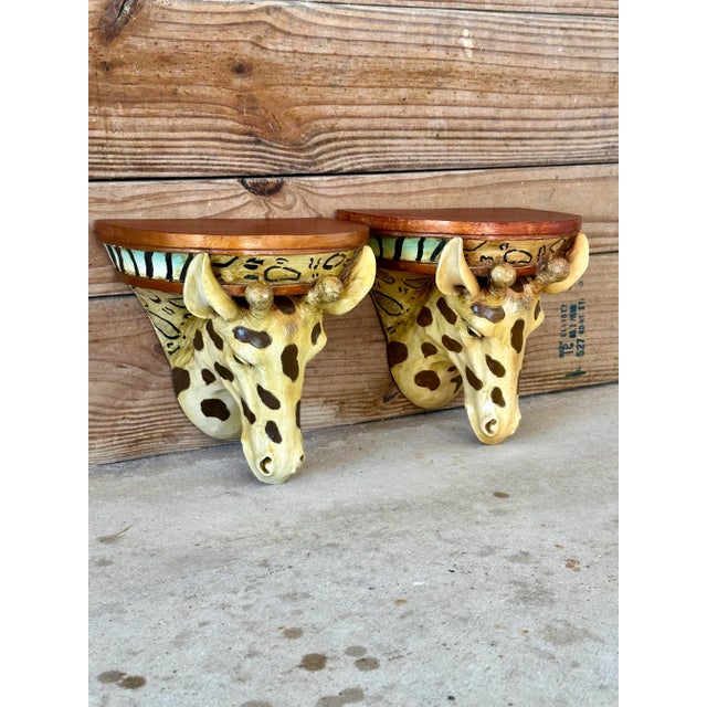 Adorably fun and unique vintage sculptural cast resin painted giraffe wall brackets great for kids room or in a safari...