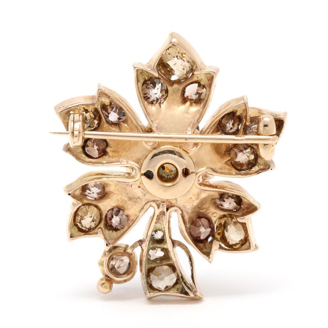 Stones: diamonds old European cut 2 - 4.75 mm approximately 3.85 total carats Brown color, SI1-I1 clarity Please note that...