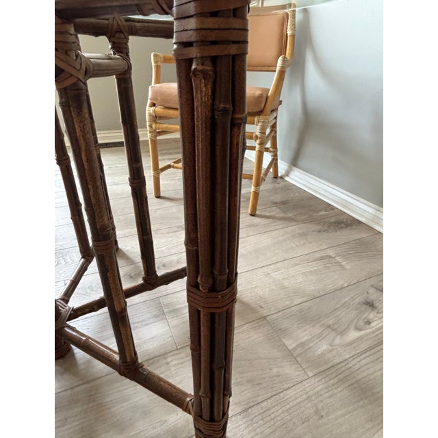 Incredibly well taken care of vintage McGuire dining room set from San Francisco. All 6 chairs have the pearlized M logo....