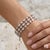 18k Martin Flyer white gold triple row filagree diamond bracelet. 196 round diamonds weighing 4.36 carats. 23.28 grams