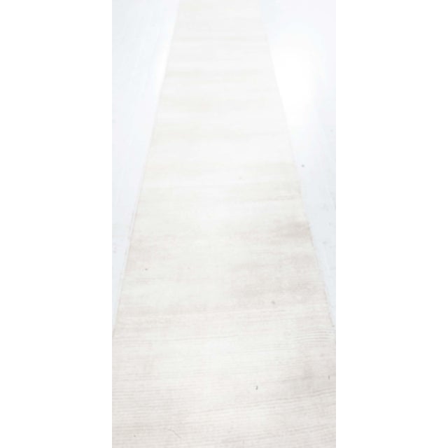 Modern Beige Hand-Knotted Wool Runner by Doris Leslie Blau Size: 2'1" × 16'9" (63 × 510 cm) This refined contemporary...