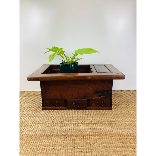 Vintage / Antique Asian Wood Hibachi made of wood multiple drawers for storage lined in copper tone metal mostly used in...