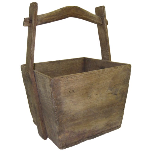 Transport yourself to the timeless allure of ancient China with this captivating vintage grain box. Once used to carry...