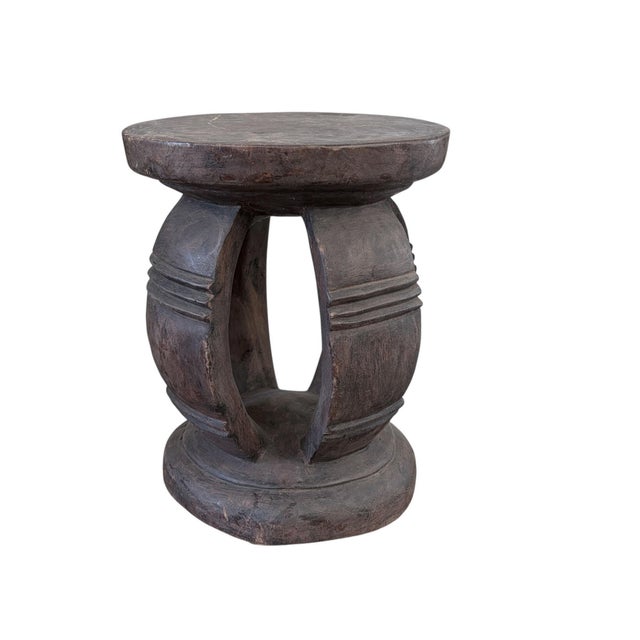 Superb hand-sculpted stool carved from a single piece of heavy solid wood by the Baga people of Guinea-Bissau. The Baga...
