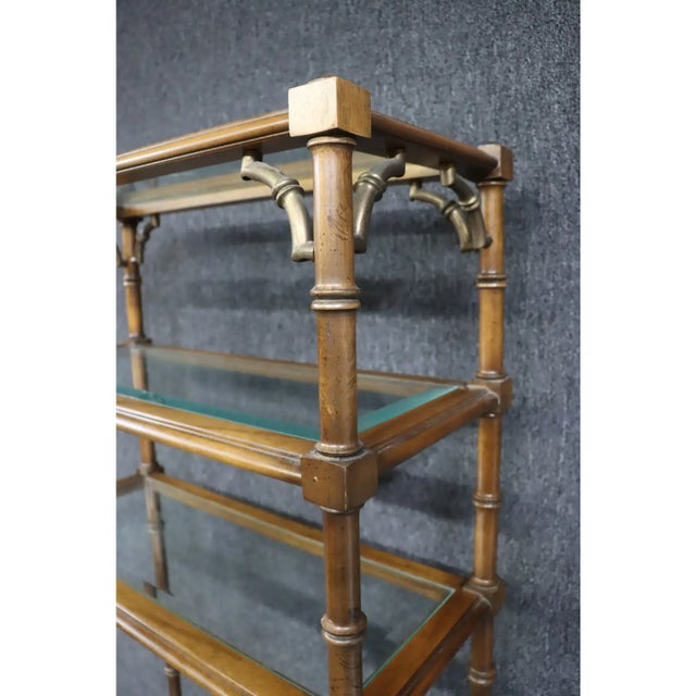 Regency style etagere, solid maple with faux bamboo wood carved post , brass corner accents , beveled glass shelves.