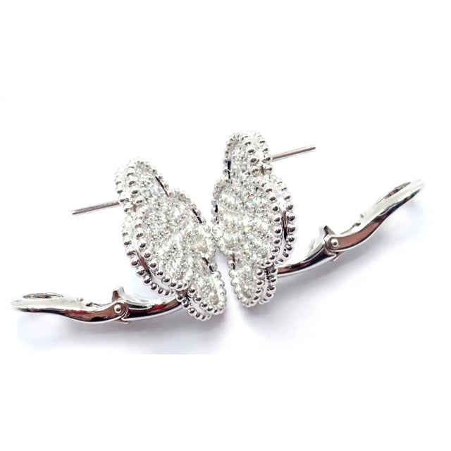 Van Cleef & Arpels 18k White Gold Magic Alhambra Diamond Earrings *These earrings come with Van Cleef & Arpels certificate...