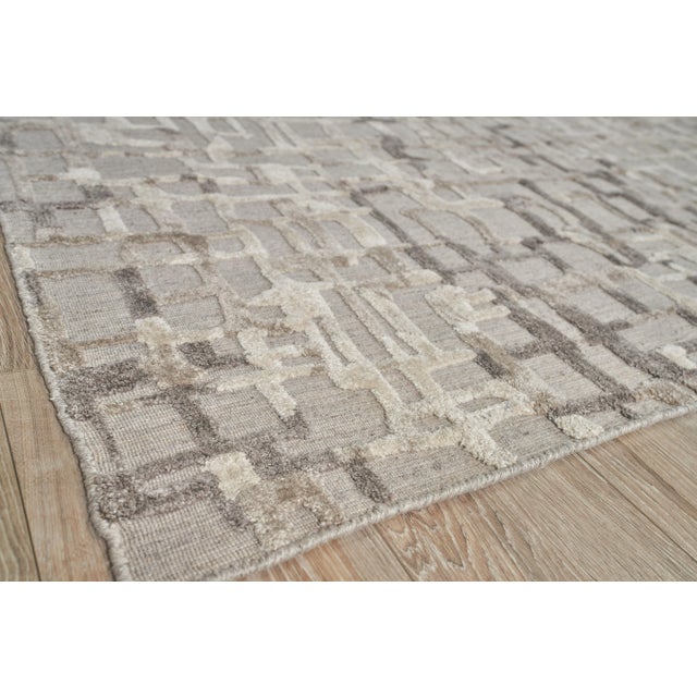 The Vista rug reimagines contemporary design with its dramatic high low patterns and exciting color palette. An allover...