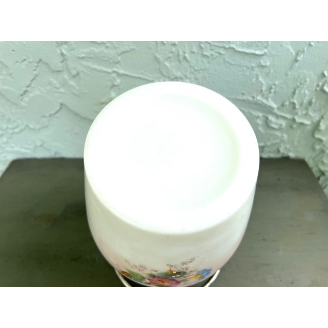 A beautiful antique Victorian biscuit jar crafted from opaline glass with a subtle blush tint. The surface is adorned with...