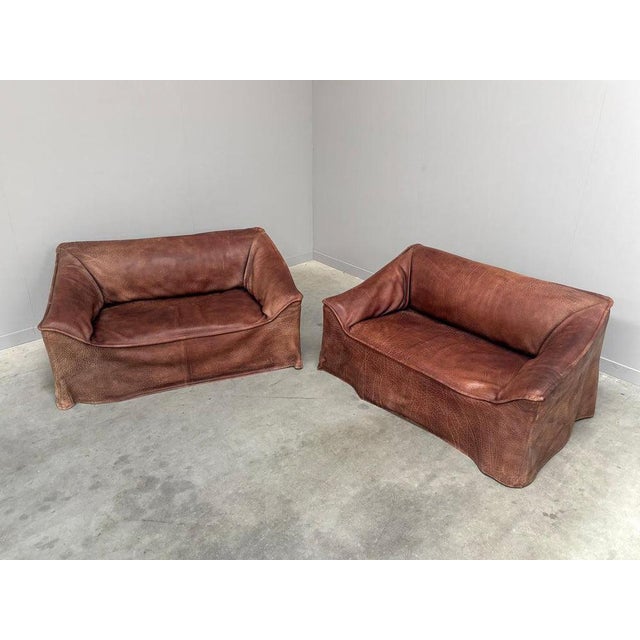Mid-century sofa by Lesser, Germany 1970s. Wooden frames with foam and fabric and internal springs. Sofas are finished...