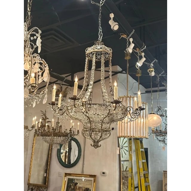 Elegant late 18th century Italian chandelier with 8 lights. Beautiful glistening crystals with nicely shaped base. Gorgeous!!