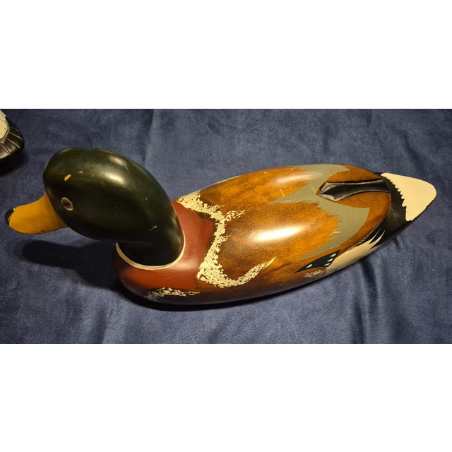 This is a vintage Emson-style hand-painted wooden mallard drake duck decoy designed for rustic cabin or wildlife folk art...