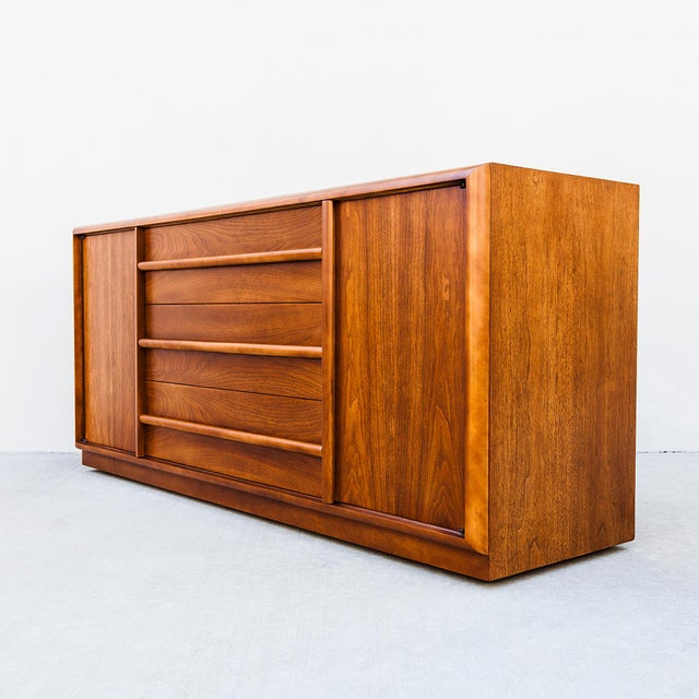 Restored walnut buffet / credenza by T.H. Robsjohn-Gibbings, produced by Widdicomb in Grand Rapids, Michigan in the 1950s....