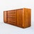 Restored walnut buffet / credenza by T.H. Robsjohn-Gibbings, produced by Widdicomb in Grand Rapids, Michigan in the 1950s....