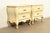 A beautiful pair of French Provincial Louis XV style two drawer nightstands By White Furniture USA, Circa 1970s Carved...