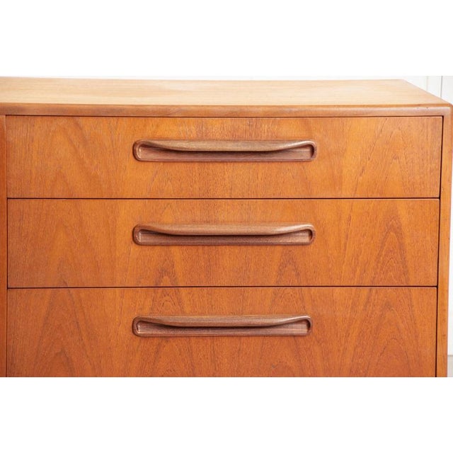 This is a midcentury g plan fresco double chest of drawers, crafted in the 1960s. Its clean lines, practical storage, and...