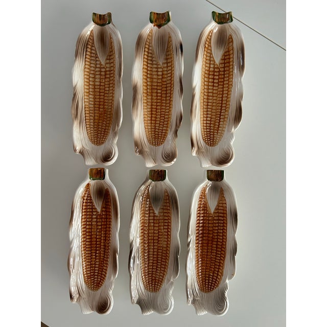 Fun, retro serving plates for summer barbeques or Thanksgiving celebration. Ceramic corn cob plates in earthy tones of...