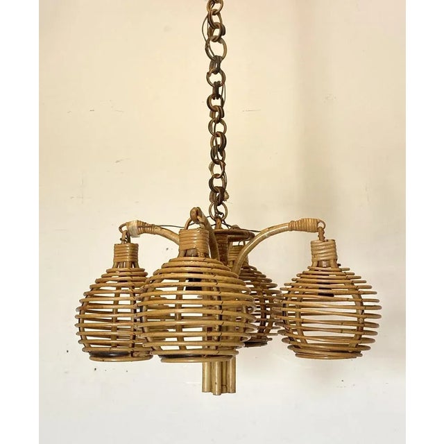 70s bamboo chandelier, 4 lights, the height of the chandelier alone is 32 cm. Up to 250V (Europe/UK Standard).The wiring...
