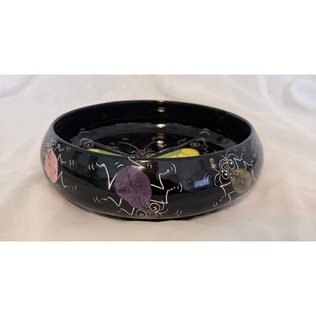 Authentic Leith Dillon studio pottery bowl, hand-thrown and hand-decorated. This piece features a striking black glaze...