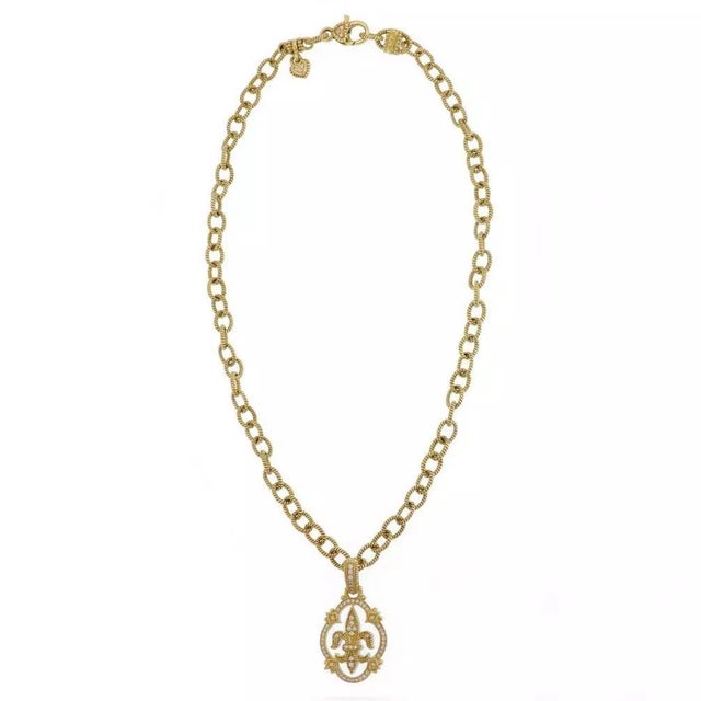 An authentic and beautiful bracelet for your collection. It crafted from 18k yellow gold featuring a 16mm wide dome shape...