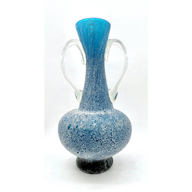 This exceptional amphora vase is attributed to the circle of flavio poli for seguso vetri d’arte and represents the...