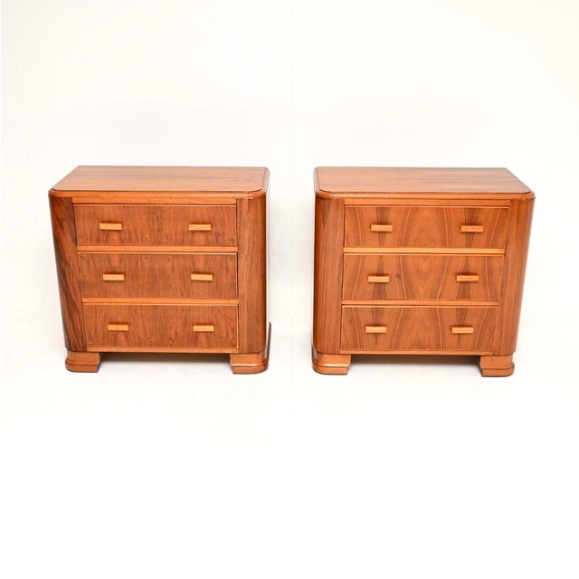 A smart and beautifully designed pair of Art Deco figured walnut bedside chests. They were made in England, they date from...