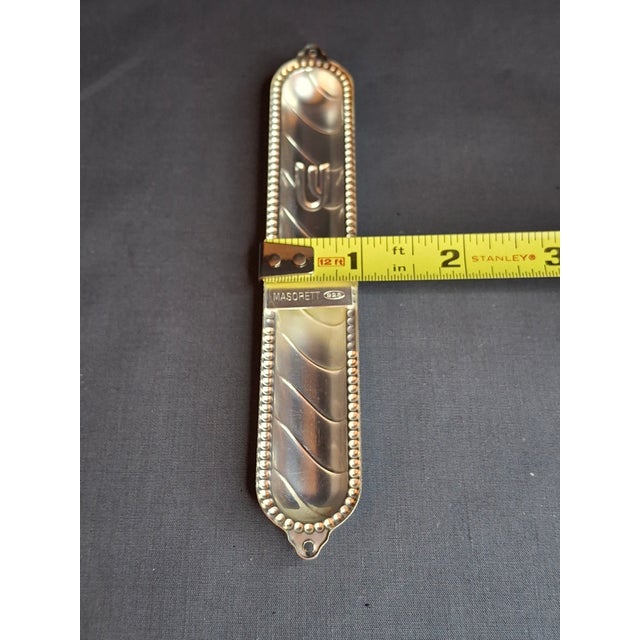 Offered is a beautiful vintage 925 sterling silver mezuzah case crafted by the renowned Israeli Judaica manufacturer,...